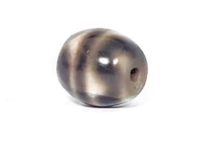 Ac-021724-TT ancient round tiger tooth dzi, fifth face view, composition shifted from rotation, unretouched