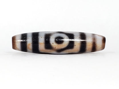 Antique Tibetan Three Eye Dzi bead, 47.8mm — deep black natural agate with bold cream eye circles, extreme cinnabar bloodspots, 100–200 years old — At-0426-3EBS2