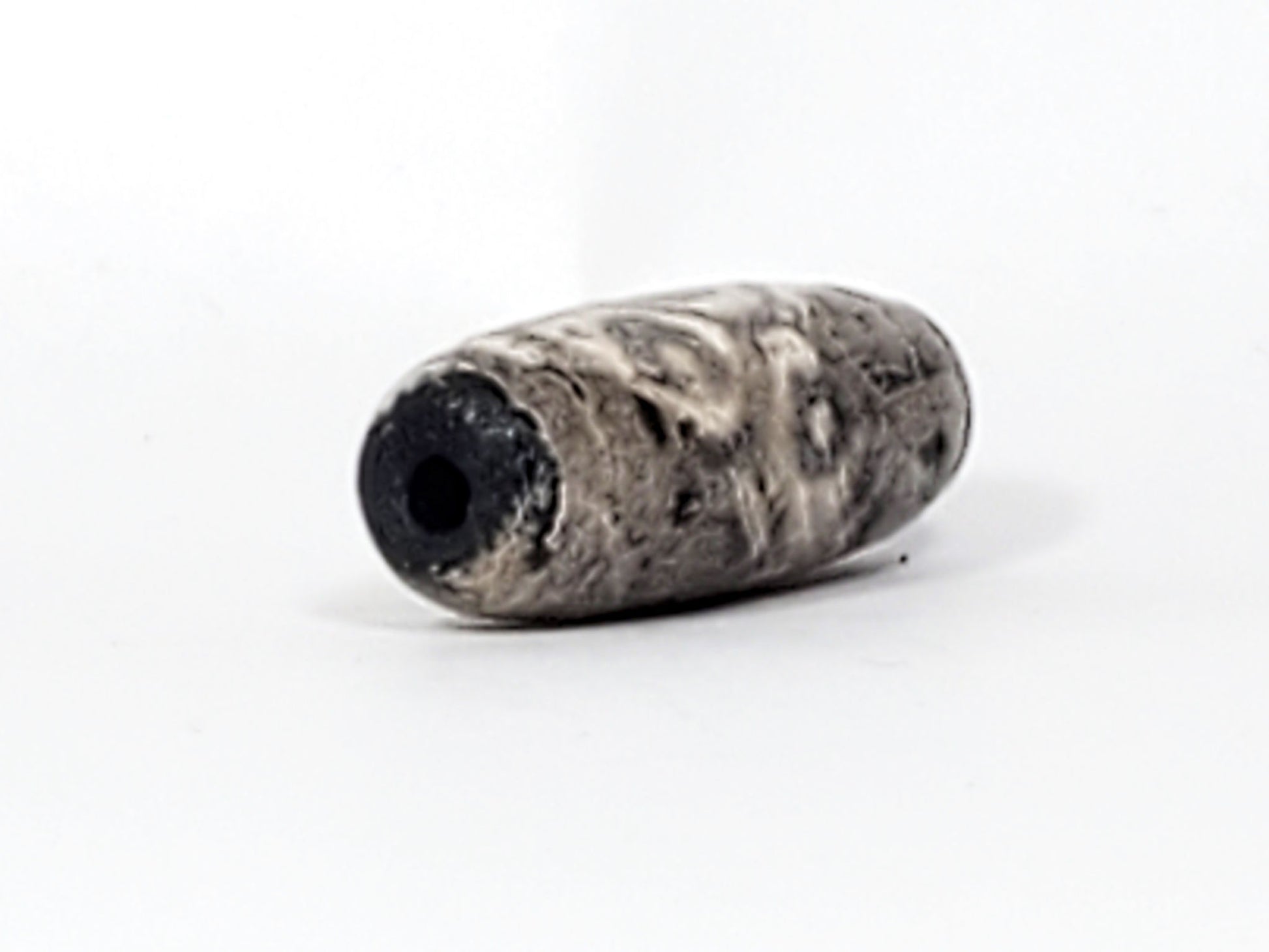 Ac-071026-12EL ancient twelve eye lotus dzi angled drill end B pitch-black interior calcification wrap unretouched