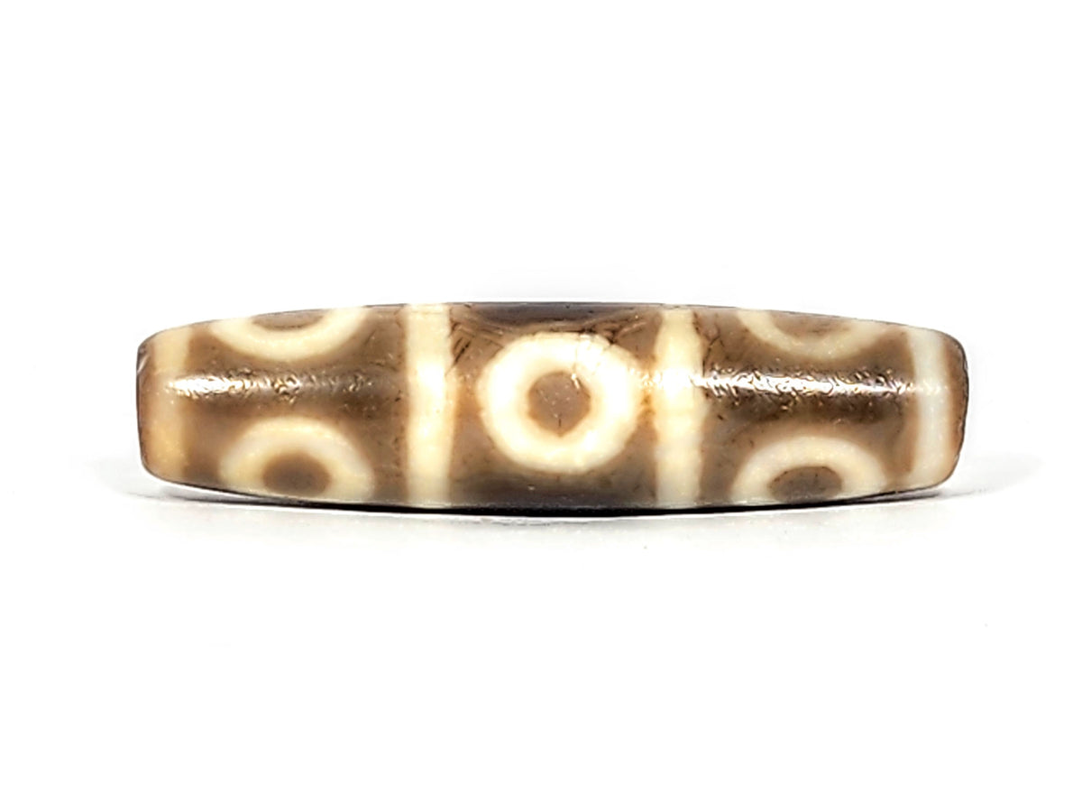 Ac-071026-8E ancient eight eye dzi warm grey-brown agate face C five eye positions two registers unretouched