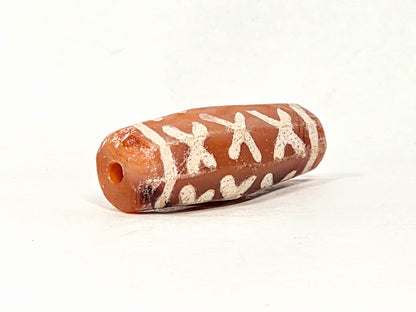 Ac-062426-12X ancient twelve X-cross carnelian dzi 28.5x11.0mm opposite end drill hole natural colour variation unretouched