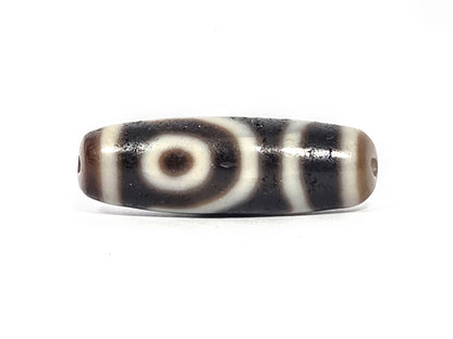 Ac-073026-2E ancient two eye dzi pitch-black agate face B second eye both drill holes visible unretouched