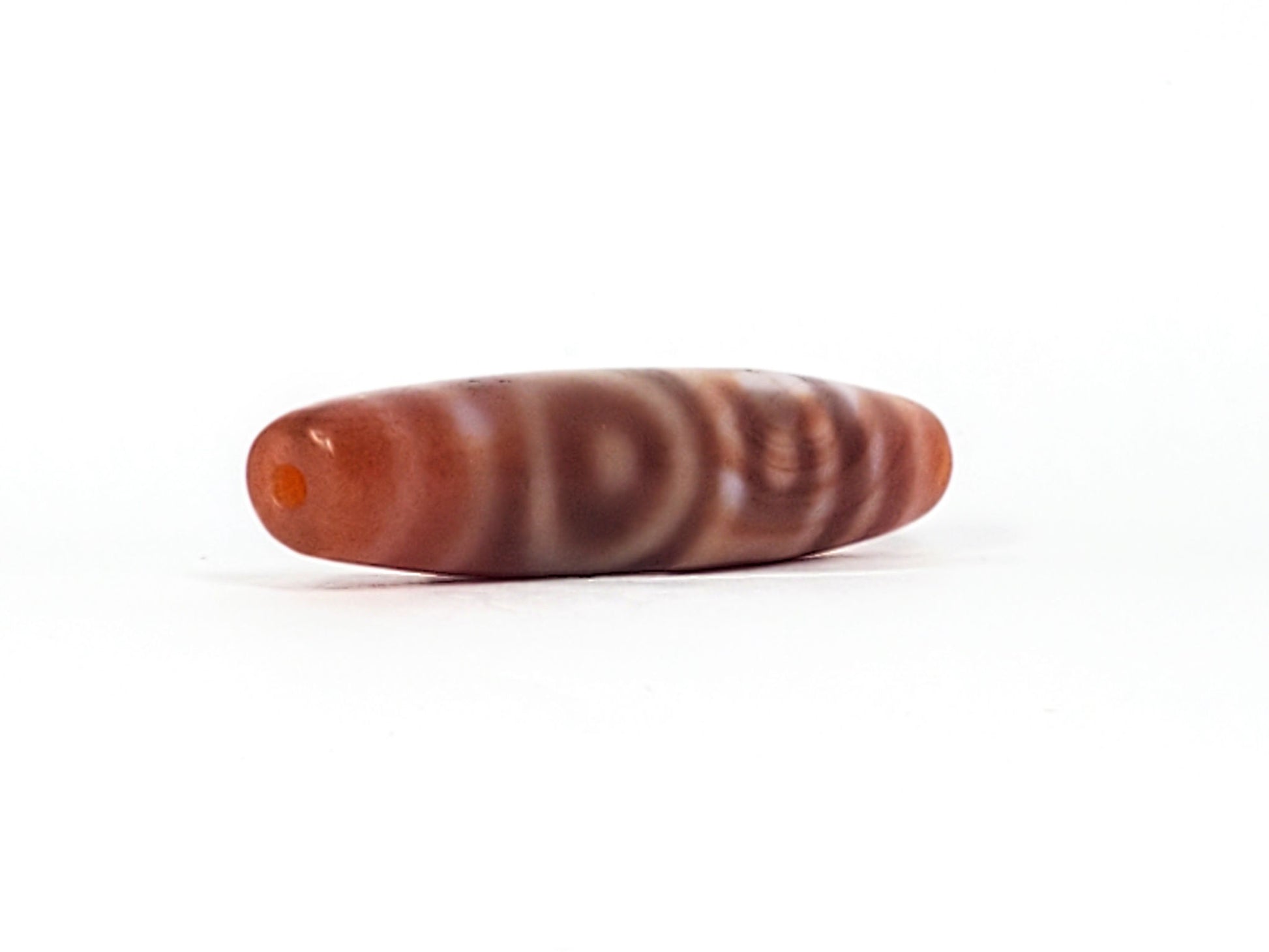 At-102324-DHGE three-quarter view End A terracotta cap full spindle profile dzi unretouched