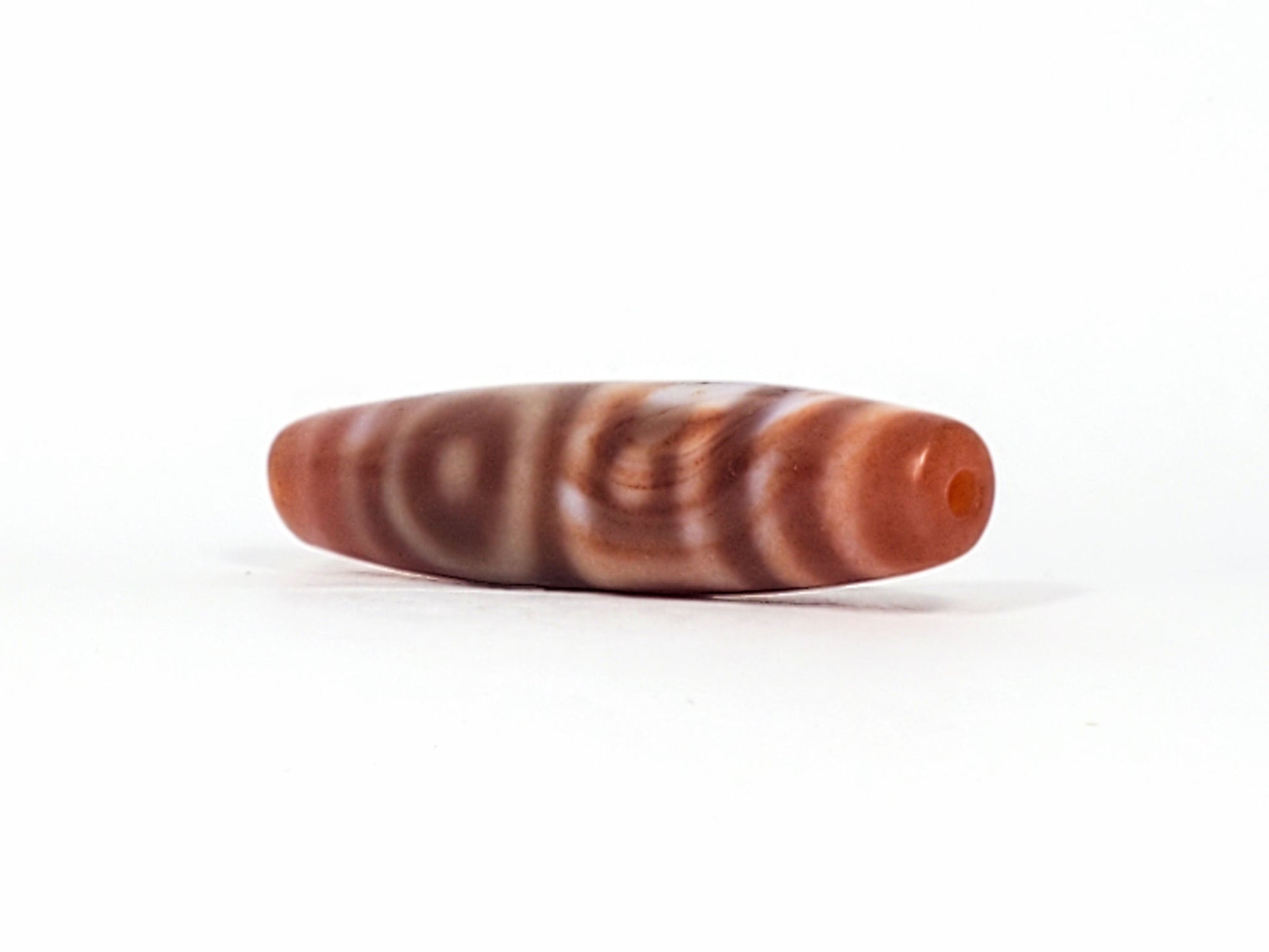 At-102324-DHGE three-quarter view terracotta end cap spindle body 60.1mm dzi unretouched