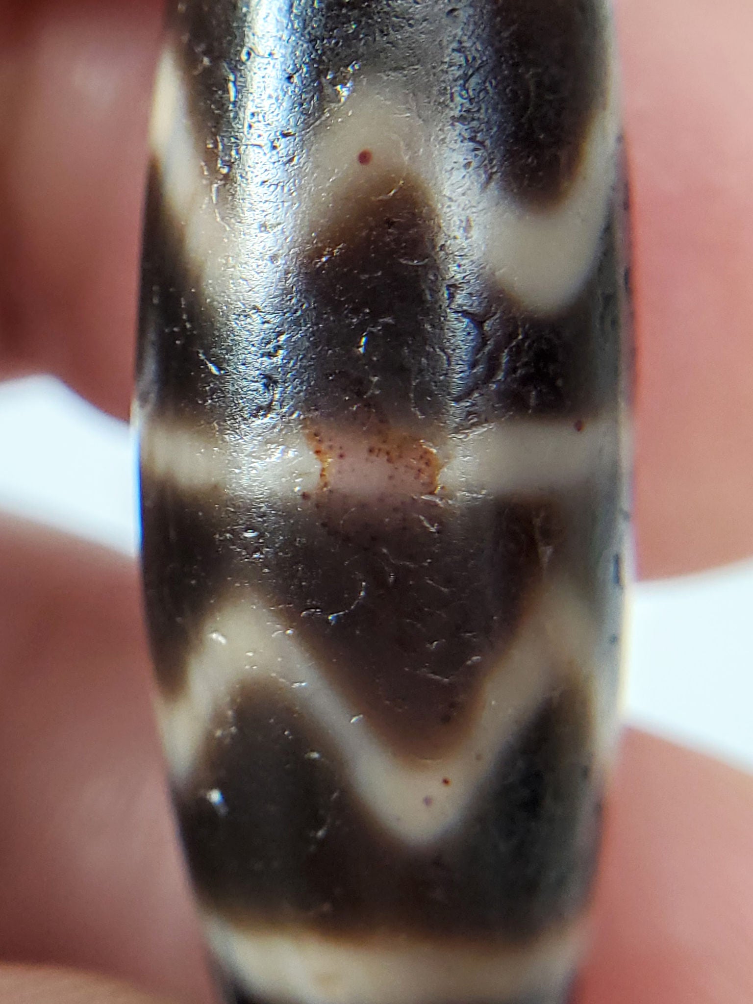 At-102524-DTT macro face B rust-orange cinnabar patch cream zone charcoal-brown dzi unretouched