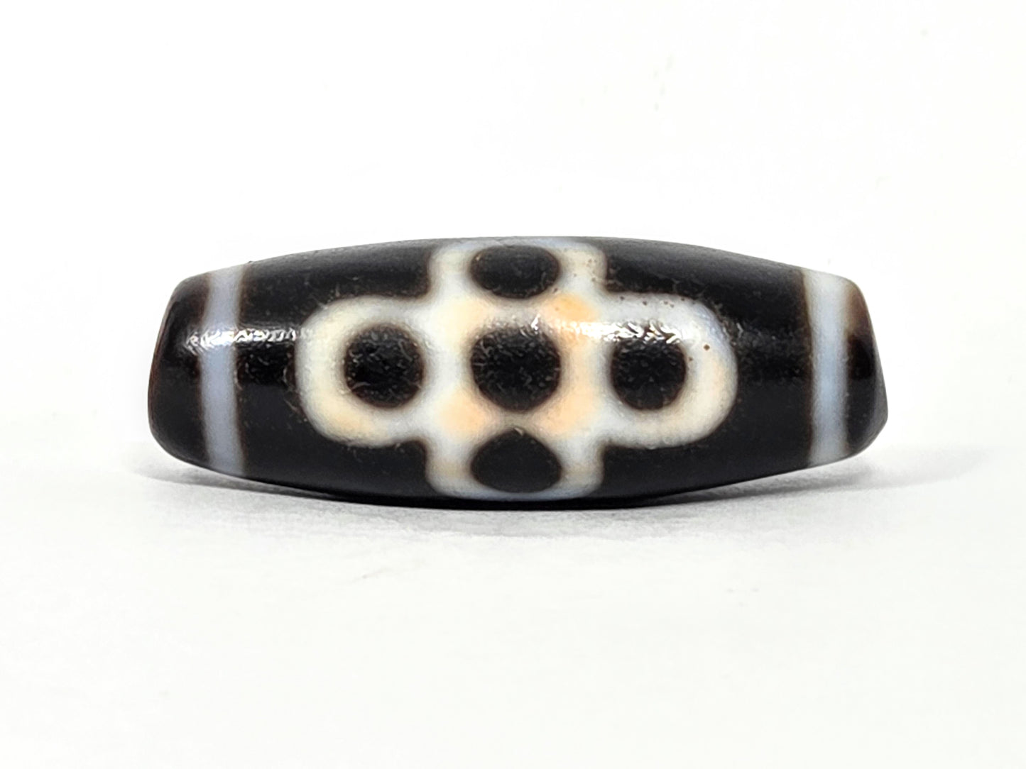 At-062026-5ELT five eye Garuda dzi face, cream meander, 35.8mm, unretouched 