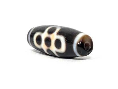 At-062026-5ELT angled view, eye cluster and end cap, warm brown drill
