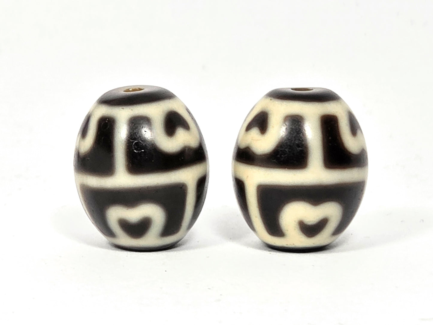 Pair of authentic round Tibetan Six-Eye Lotus Dzi beads made of natural ancient agate.