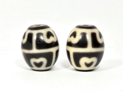 Pair of authentic round Tibetan Six-Eye Lotus Dzi beads made of natural ancient agate.