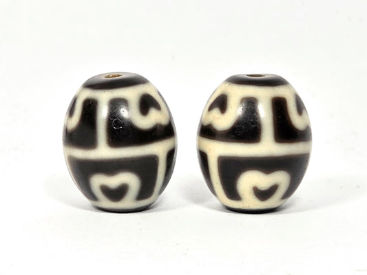 Pair of authentic round Tibetan Six-Eye Lotus Dzi beads made of natural ancient agate.