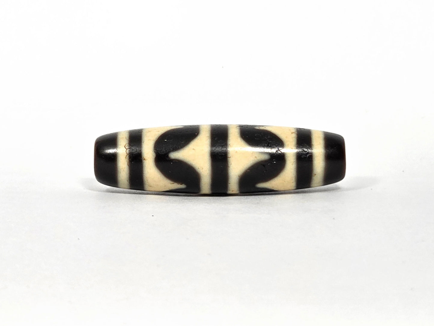 At-090226-DW9 antique double wave dzi 41.6×11.6mm dark brown black agate face A wave arcs, unretouched