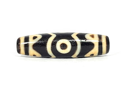 At-061926-3ETT Face B, closed ring eye, double-arc crown, warm cream-beige motif lines, unretouched