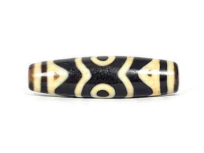 At-061926-3ETT connector face, tiger tooth X-chevron composition, no eye, pitch-black agate, unretouched