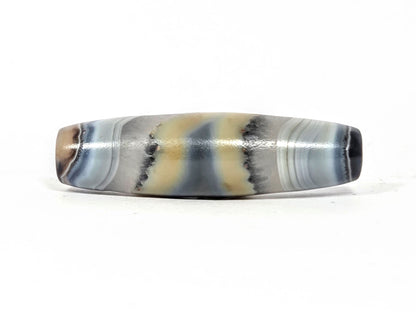 At-N-013126-1E opposite face detail, grey and tan banding
