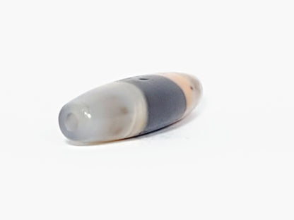 At-061526-1SBow, drill hole end cap face, milky grey-white agate, matte-satin finish, pinholes visible, unretouched