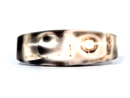 Six Eye Dzi bead, pale warm-brown agate with cinnabar bloodspots, 35mm barrel shape