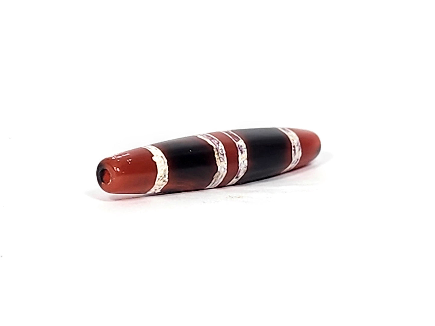 At-122324-3TS antique 3-stripe carnelian dzi, 48.7×9.4mm, left drill hole, terracotta-red end cap, unretouched