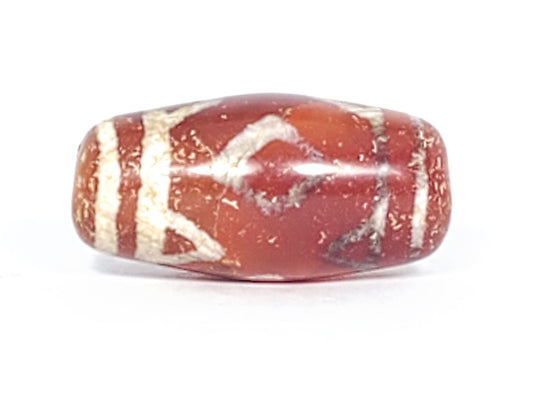 At-053126-3DETT antique carnelian dzi, Face A, diamond eye + tiger tooth motif, terracotta-red, unretouched