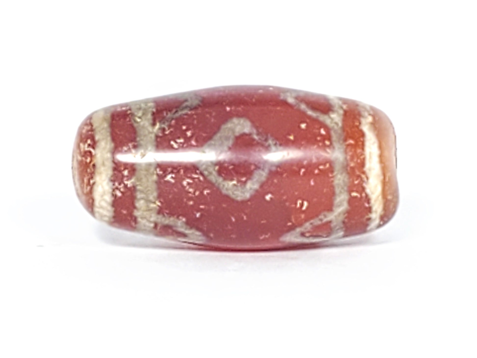 At-053126-3DETT antique carnelian dzi, Face C, worn diamond motif, grey mineral staining, terracotta-red, unretouched