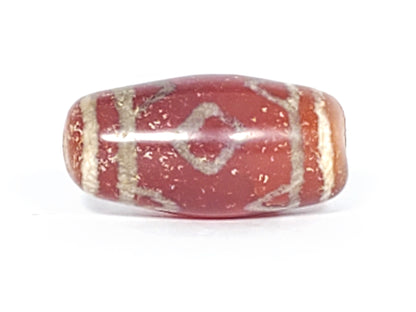 At-053126-3DETT antique carnelian dzi, Face C, worn diamond motif, grey mineral staining, terracotta-red, unretouched