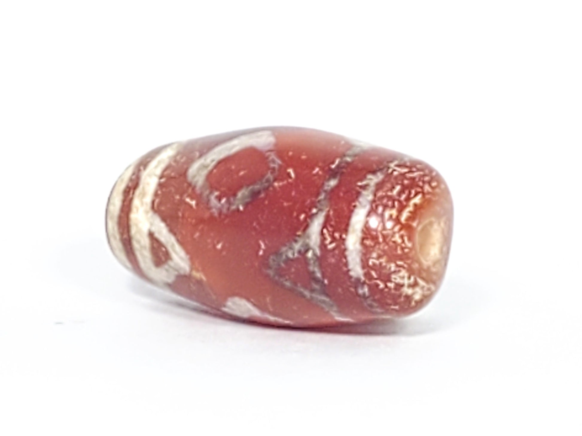 At-053126-3DETT antique carnelian dzi, right end cap drill hole, orange-red end cap, mineral collar, unretouched