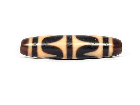 Antique Tibetan Double Wave dzi bead, honey-cream on deep brown agate, bow-tie wave motif, At-052526-DW3