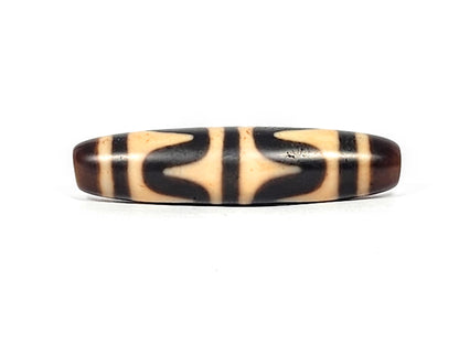 Third side view of antique Tibetan Double Wave dzi showing cream wave forms on chocolate brown agate, At-052526-DW3