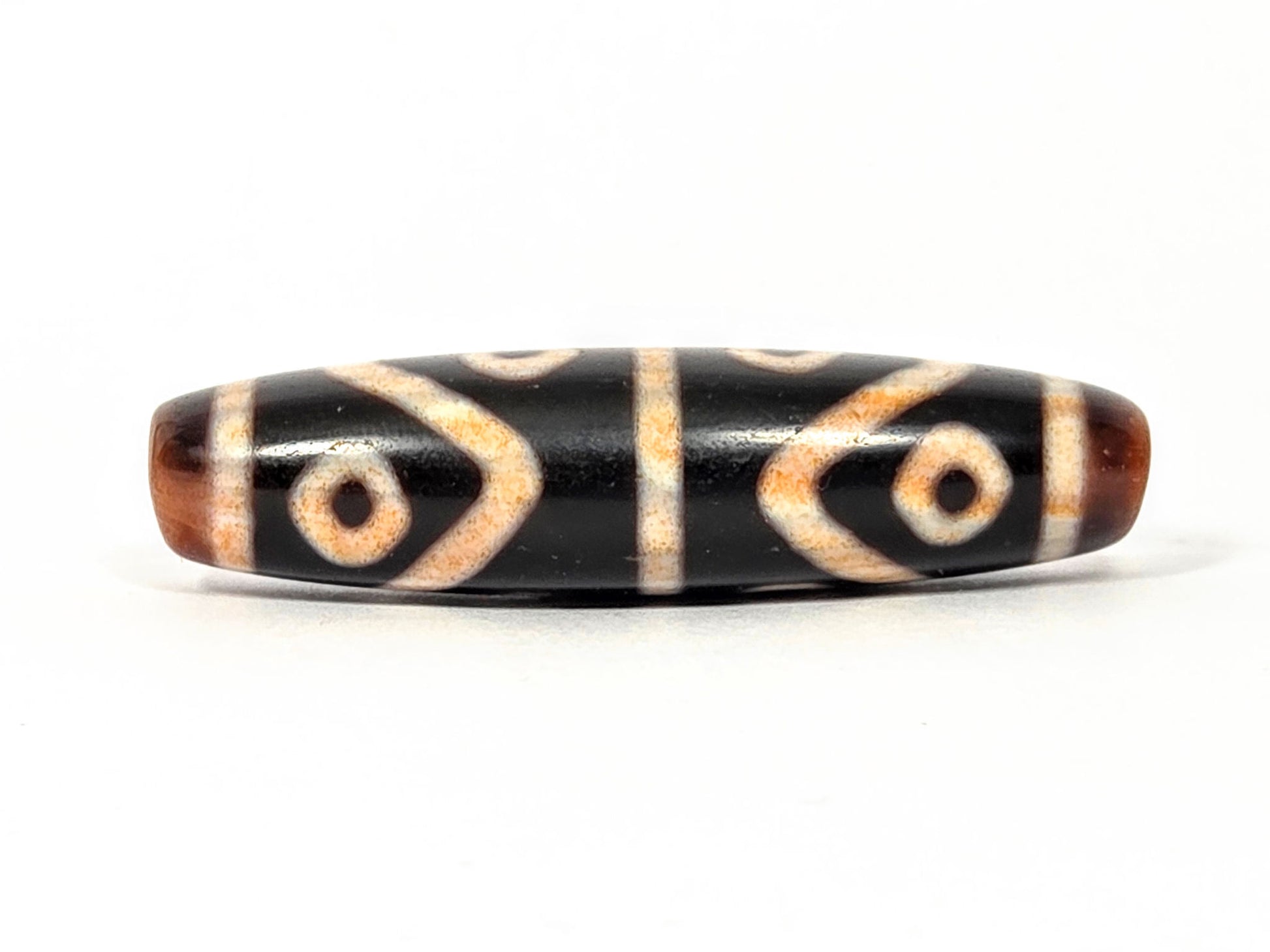 Antique Eight Eye & Tiger Tooth Dzi, 50mm — deep black agate, four eye circles, cream etching, ~500 yrs