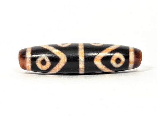 Antique Eight Eye & Tiger Tooth Dzi, 50mm — deep black agate, four eye circles, cream etching, ~500 yrs