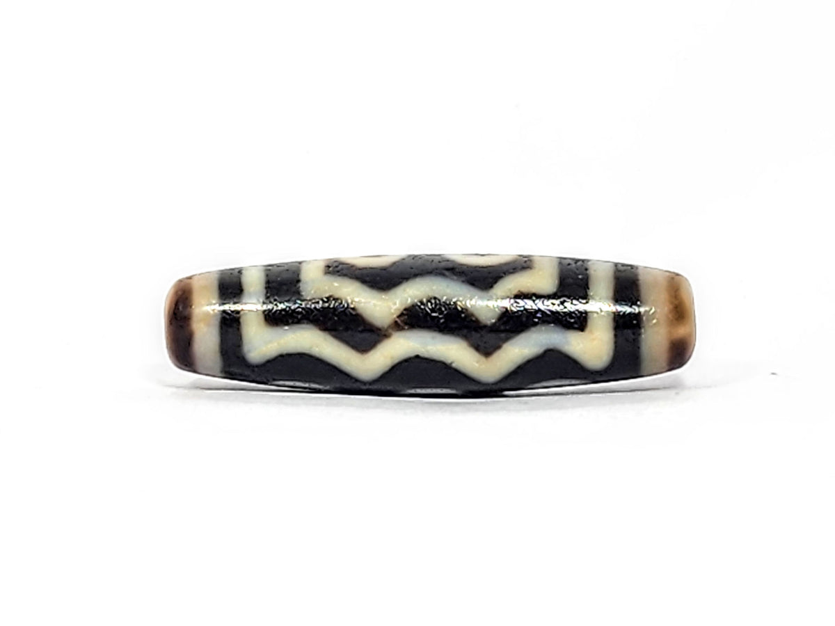 Face B of antique five eye dzi At-072625-5E, three rows of cream zigzag and wave lines on pitch-black agate, full-length wave composition, no eyes, unretouched