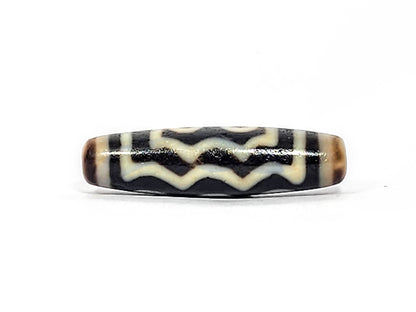Face B of antique five eye dzi At-072625-5E, three rows of cream zigzag and wave lines on pitch-black agate, full-length wave composition, no eyes, unretouched