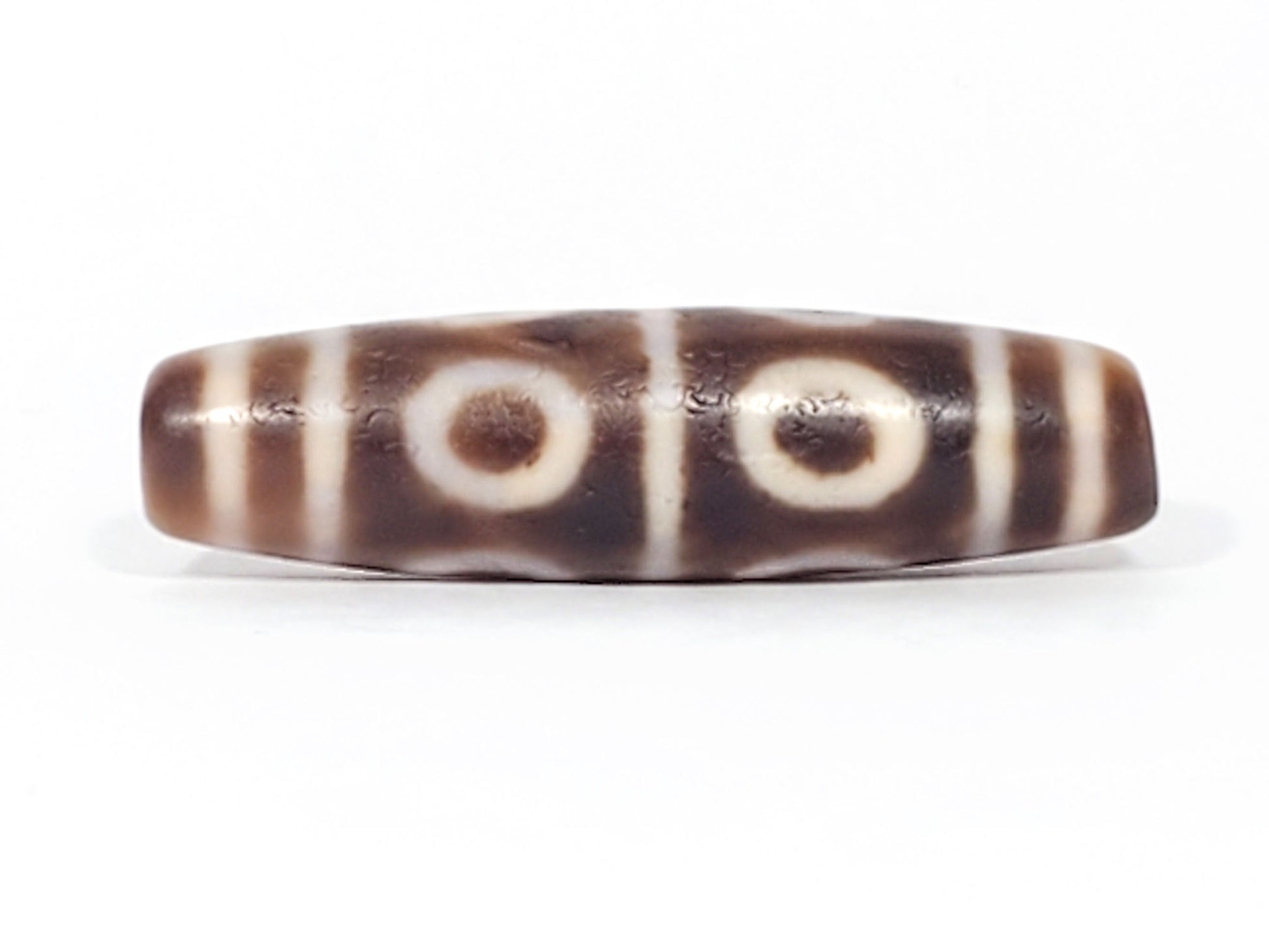 At-081624-8E face B two open-ring eyes weathering ridge warm medium-brown dzi unretouched