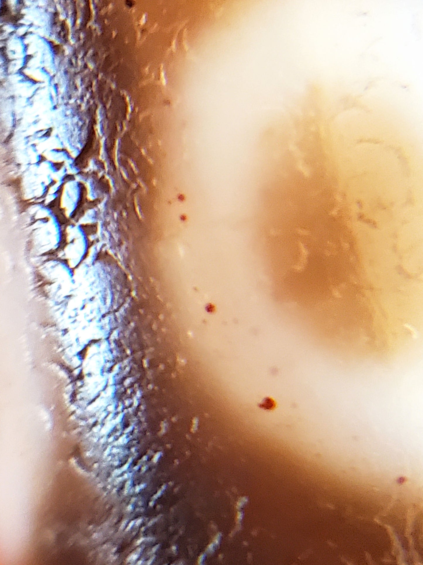 At-081624-8E macro eye interior vermilion cinnabar inclusions weathered agate boundary unretouched