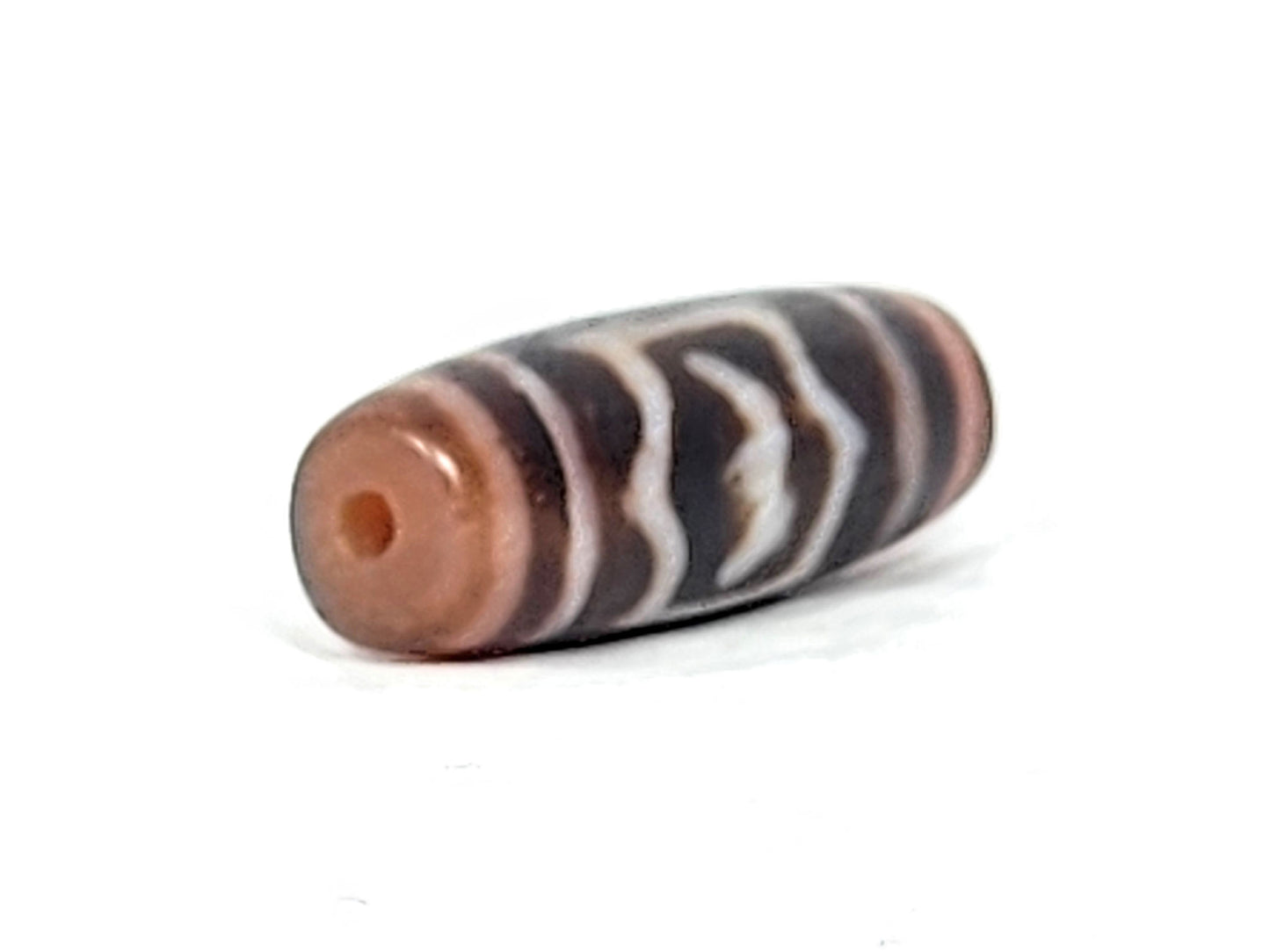 At-011425-GRD end A terracotta-russet cap orange-red drill hole dusty rose-brown stripes dzi unretouched