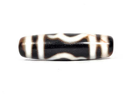 At-080426-GTBS antique Green Tara dzi bead 37.9×11.0mm, Face B showing double wave lines on pitch-black ground, stripe borders, unretouched