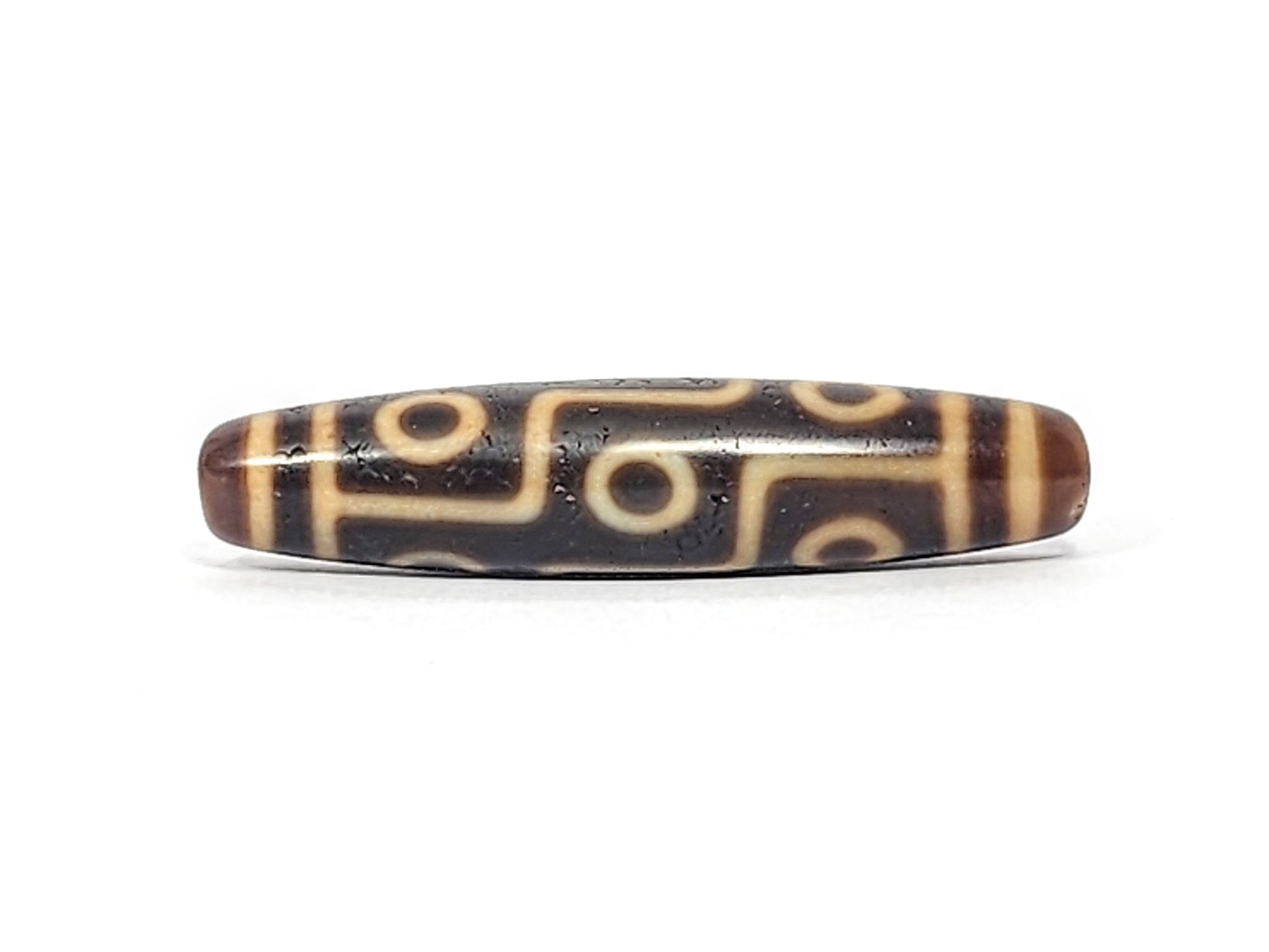 Antique Nine Eye dzi bead face B showing eye network and surface crazing on dark brown agate, At-051525-9E2