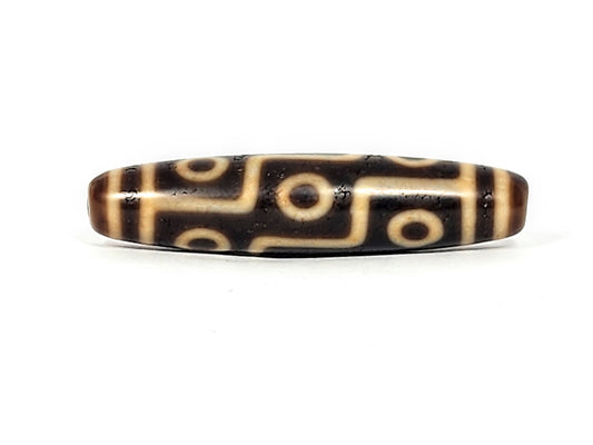 Antique Tibetan Nine Eye dzi bead face A, five cream circle eyes on warm brown agate connected by bars, At-011625-9E