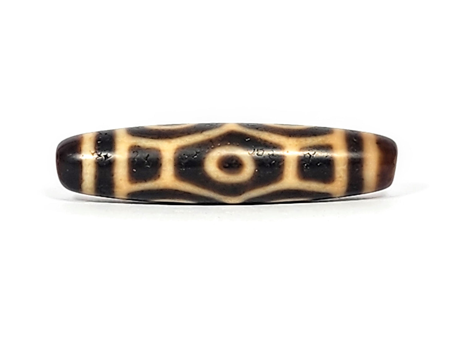 Antique Naga Dragon Eye dzi bead face B showing wide elongated hexagon body scale with single eye, At-122124-6EN2