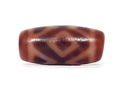 Antique Three Diamond Eye Tiger Tooth dzi At-053126-3DETT, front face, two dark brown diamond eye forms on warm terracotta-red agate, 27.5mm × 13.0mm disc-like barrel, unretouched