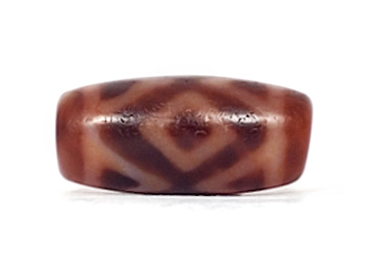 Antique Three Diamond Eye Tiger Tooth dzi At-053126-3DETT, front face, two dark brown diamond eye forms on warm terracotta-red agate, 27.5mm × 13.0mm disc-like barrel, unretouched