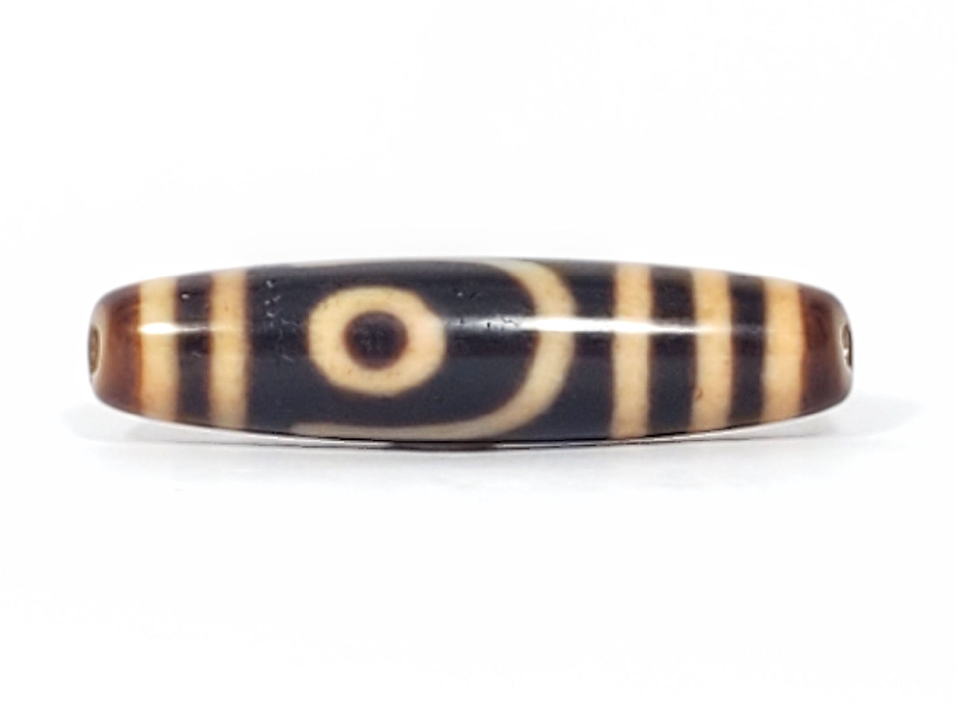 Antique Tibetan Two Eye dzi bead face A, single closed concentric ring eye on near-black agate, At-082624-2E