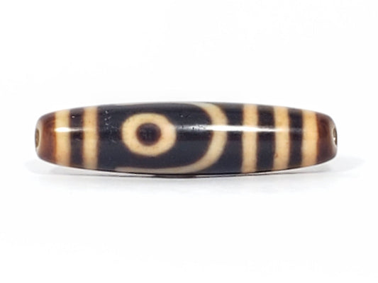 Antique Tibetan Two Eye dzi bead face A, single closed concentric ring eye on near-black agate, At-082624-2E