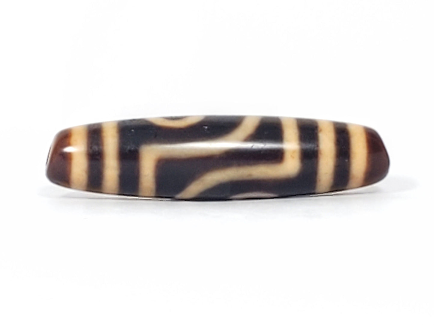 Antique Two Eye dzi bead face B showing stepped T-bracket wave form between the two eyes, At-082624-2E