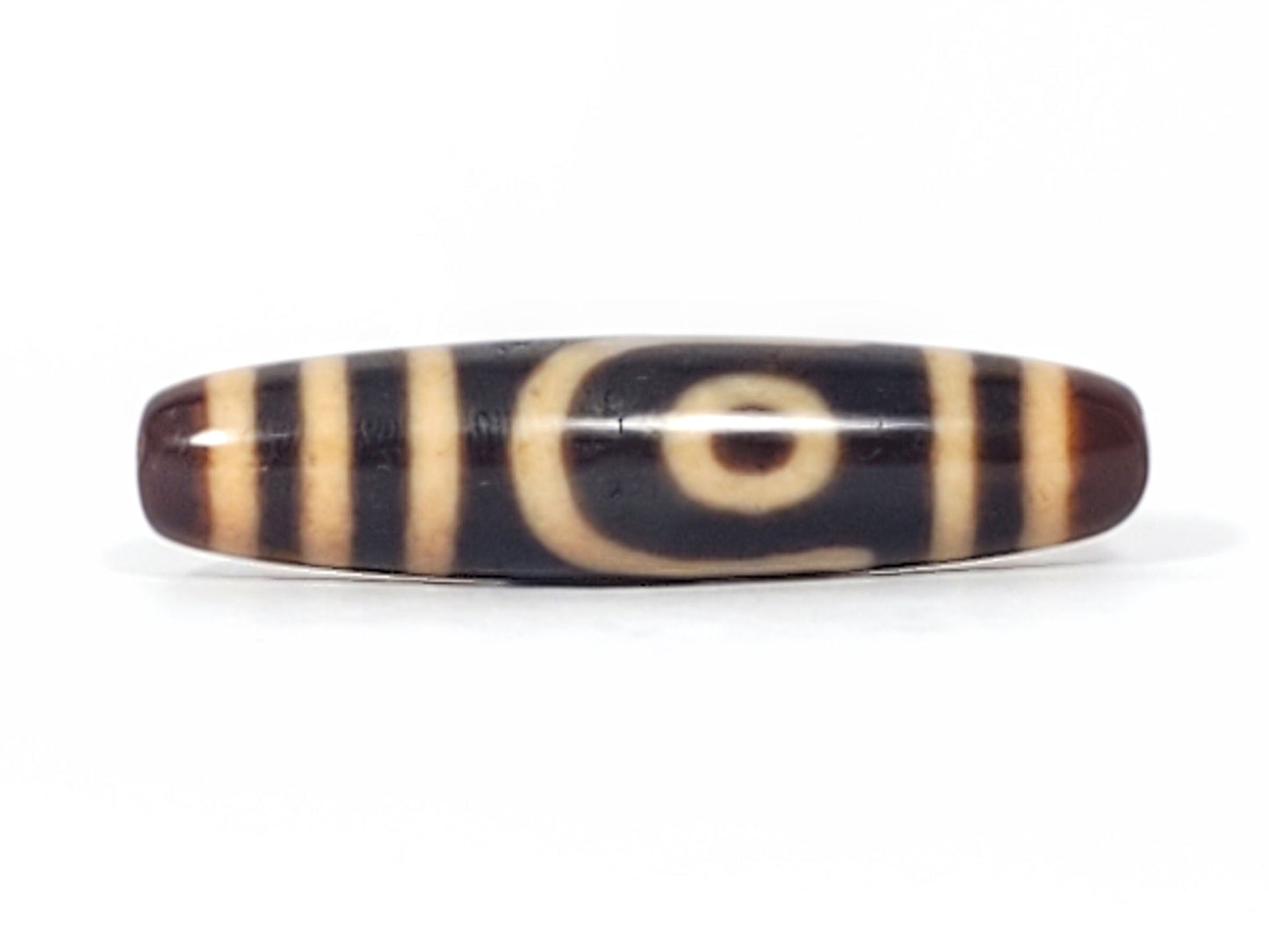 Antique Tibetan Two Eye dzi bead face C showing open C-shaped second eye on near-black agate, At-082624-2E
