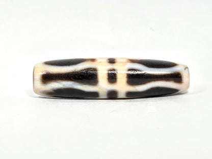 At-070626-3VjBS rotated face 2, triple vajra dzi, very dark brown upper register, cream-white bands, unretouched