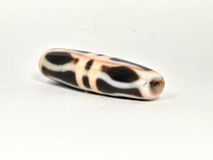 At-070626-3VjBS angled drill-end, triple vajra dzi, cream-white agate end cap, small centred drill hole, unretouched