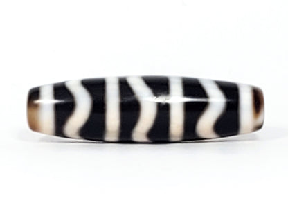 Antique Wave Stripe dzi bead side view showing alternating black and white stripe pattern, At-052526-WS