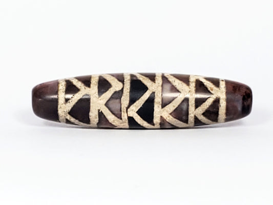 At-040524-TTStr antique carnelian dzi, 49.8×12.7mm, Face A, tiger tooth pairs + stripe dividers, tri-tone, unretouched
