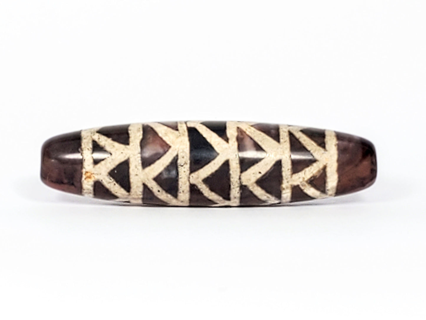 At-040524-TTStr antique carnelian dzi, Face B, reverse, worn tooth register, dark chocolate-brown ground, unretouched