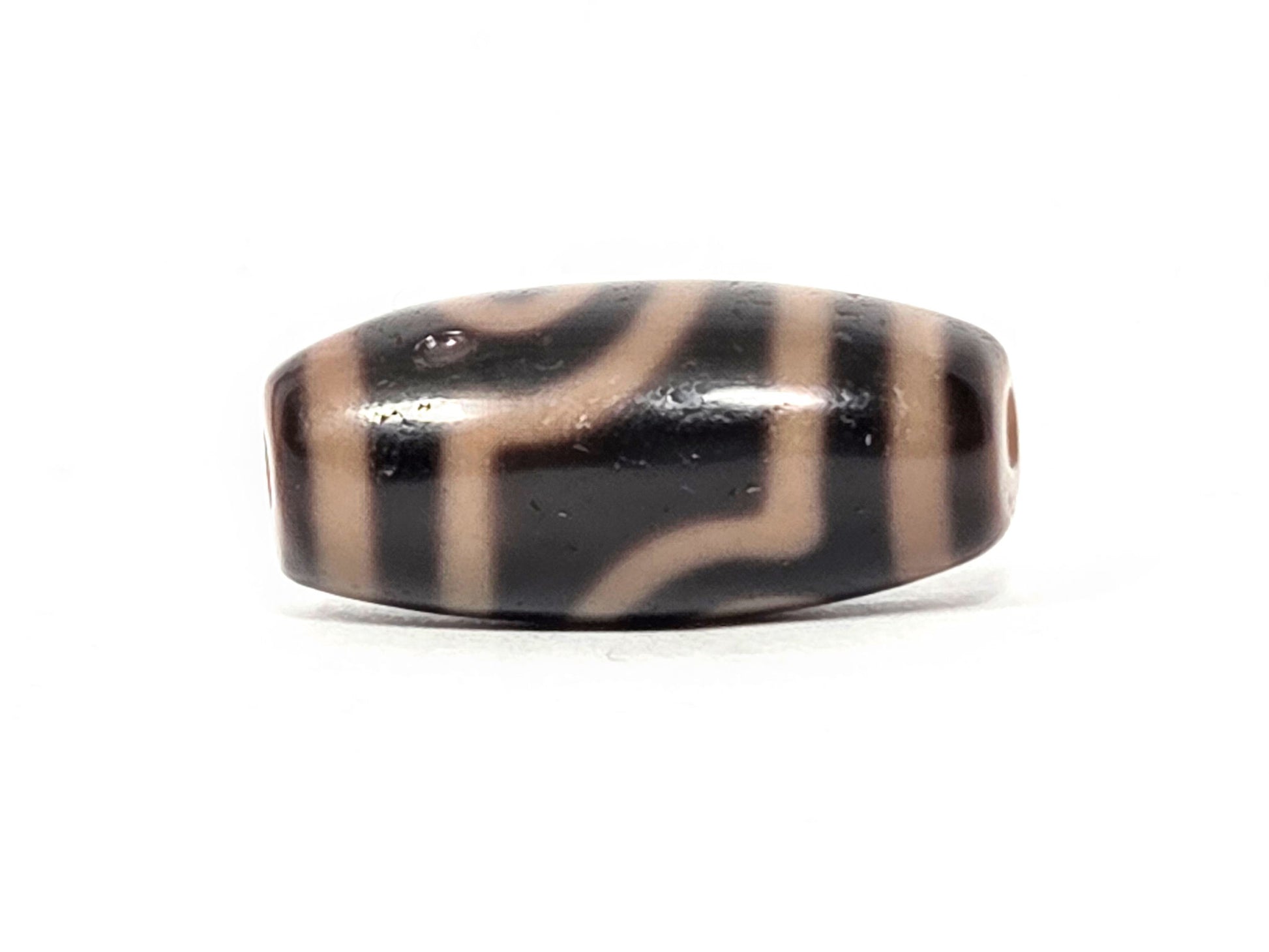 At-033126-2E5, connector face with medicine dig, flowing cream lines, dark-brown agate, unretouched